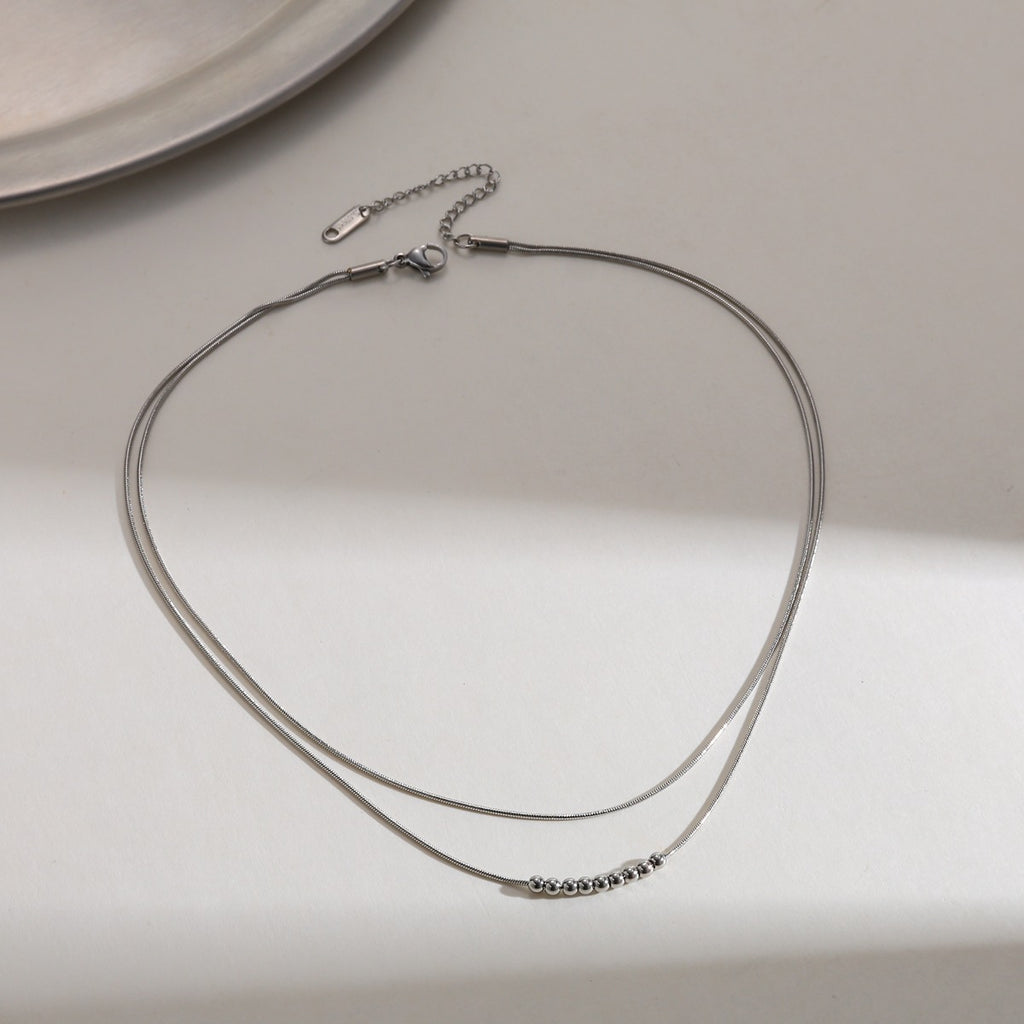 Collar cadena doble bolitas