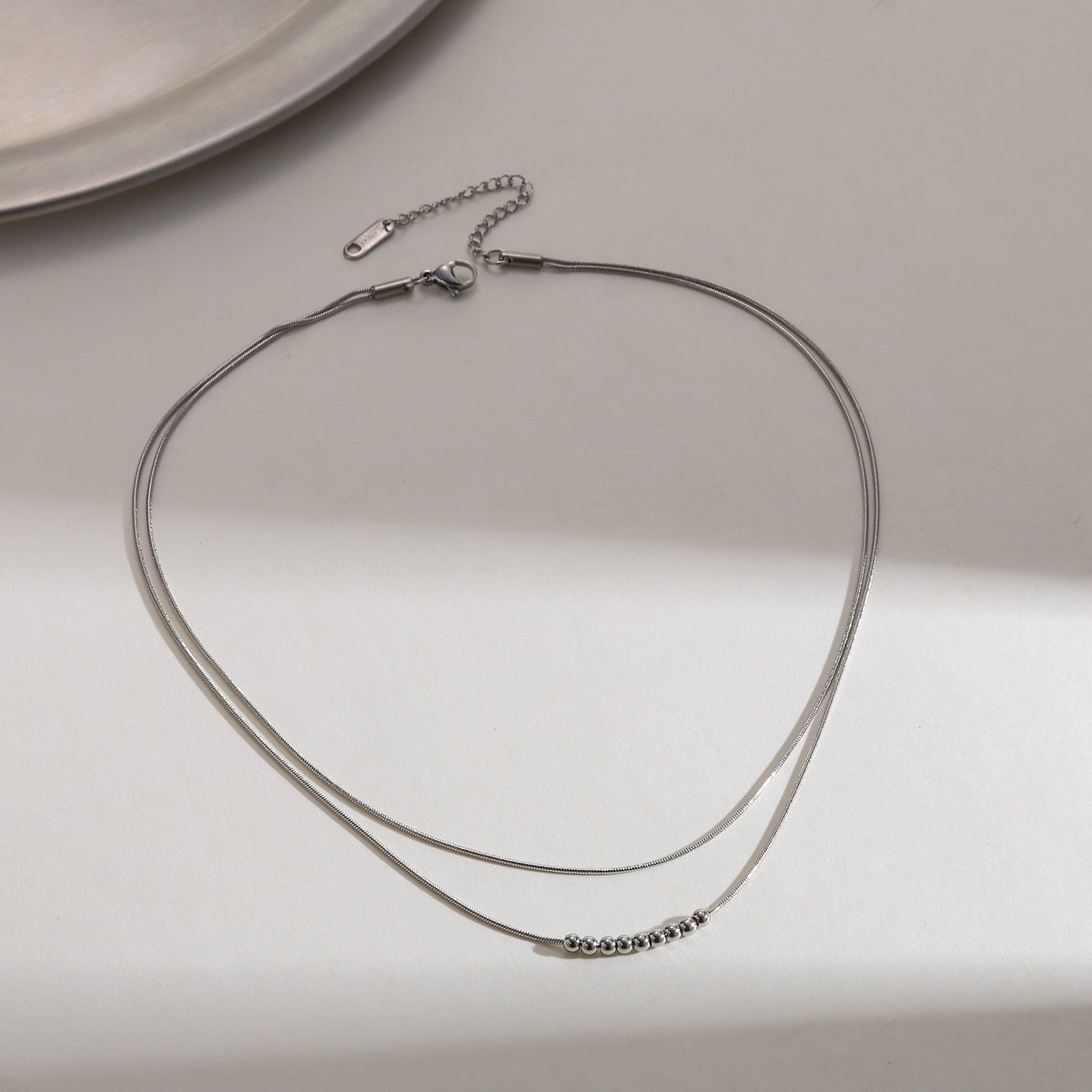 Collar cadena doble bolitas