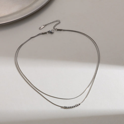 Collar cadena doble bolitas